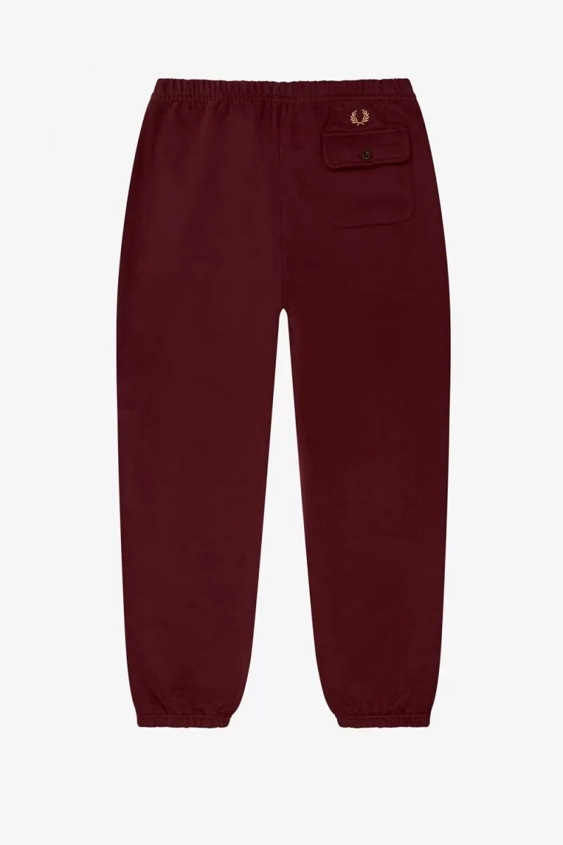 pantaloni da uomo in felpa con dettagli tascabili fred perry oxblood