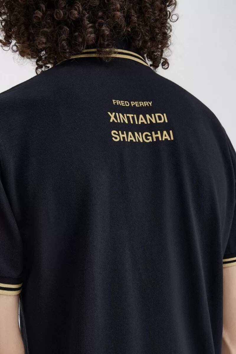 polo da uomo fred perry shanghai m12 colore nero champagne