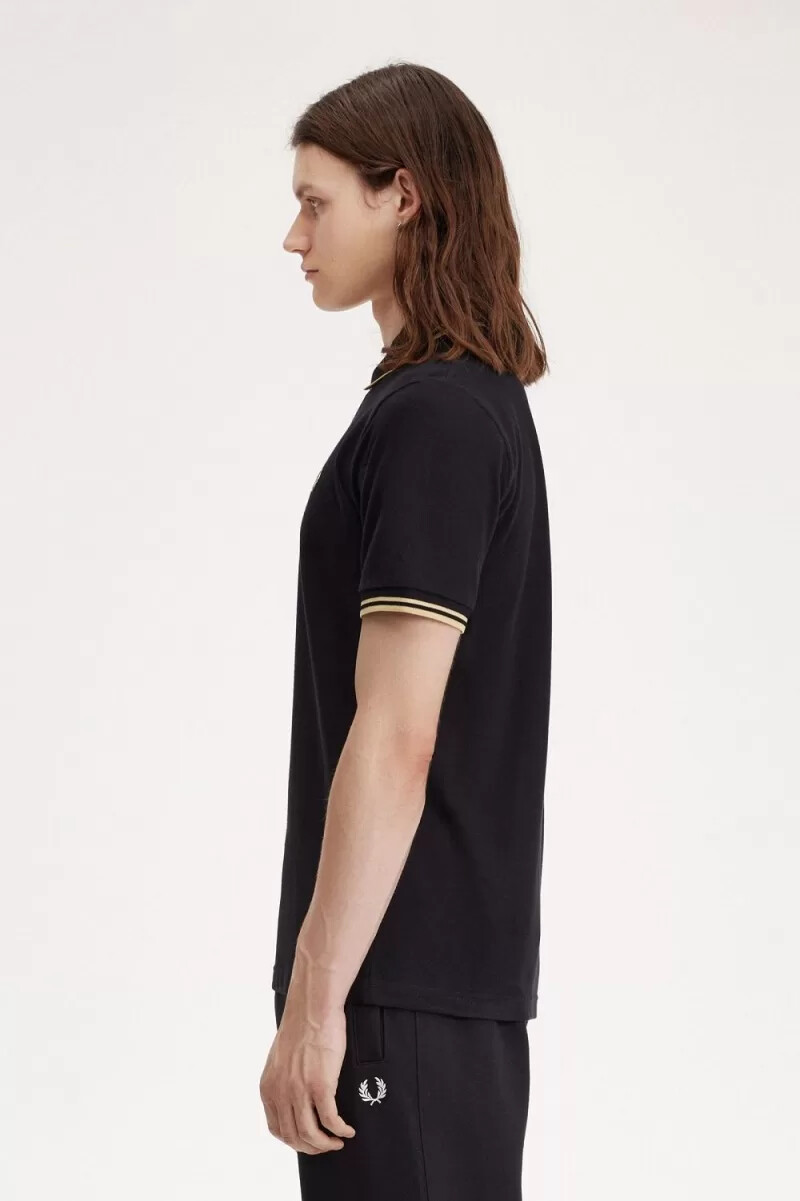 polo da uomo fred perry osaka m12 colore nero champagne